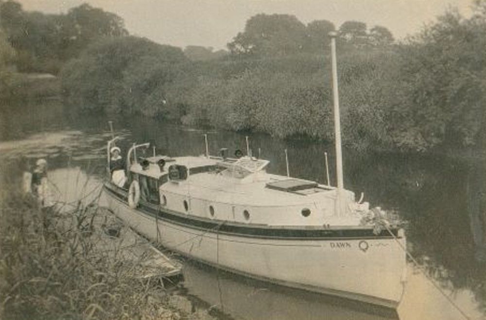 MY 'Dawn' moored in Wharfe near Laundry Cottage