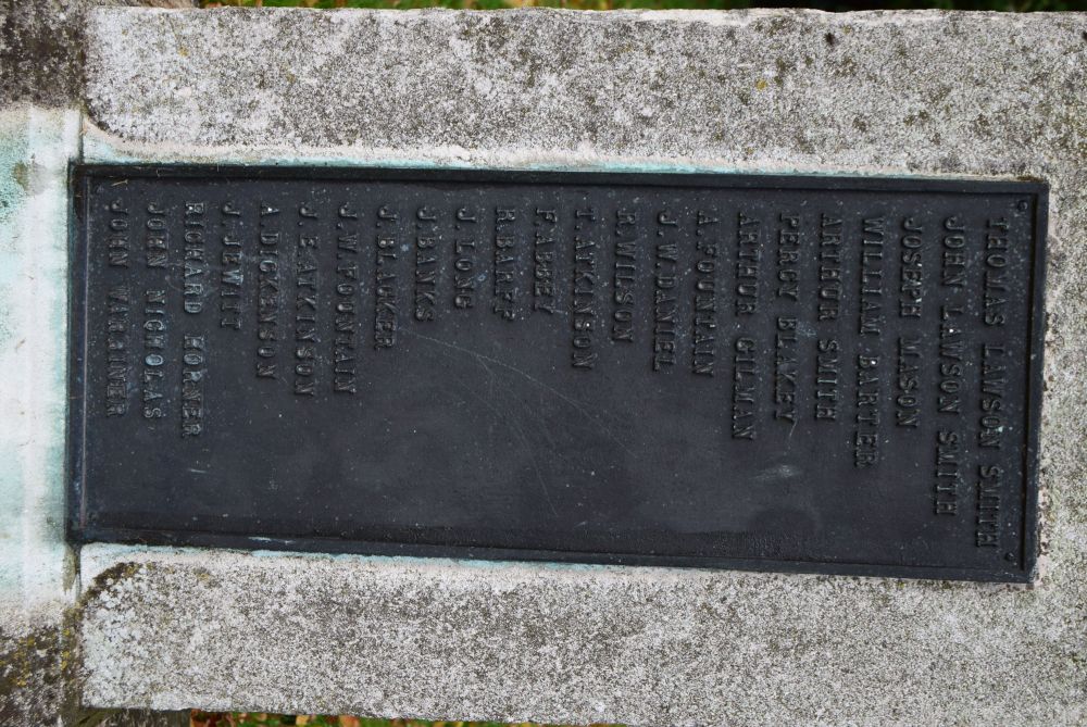 Detail of war memorial outside Bolton Percy church