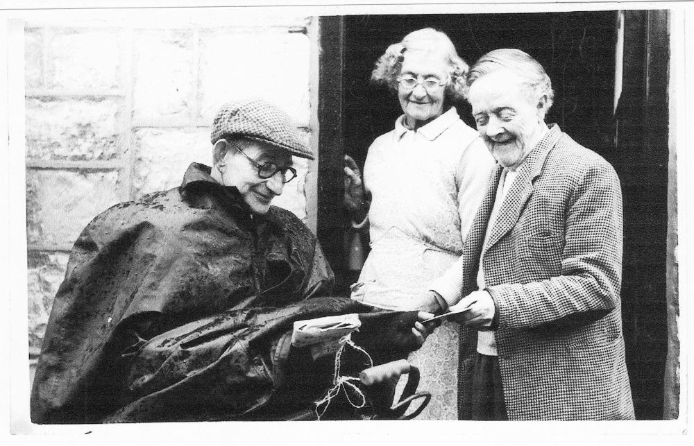 Edwin Fisher, postman, delivering Golden Wedding telegram