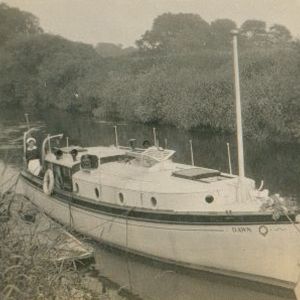 MY 'Dawn' moored in Wharfe near Laundry Cottage