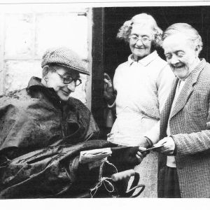 Edwin Fisher, postman, delivering Golden Wedding telegram