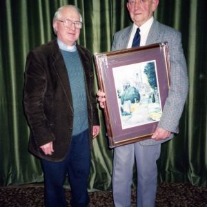 Francis Minay presents Jack Heppenstall with picture  retirement